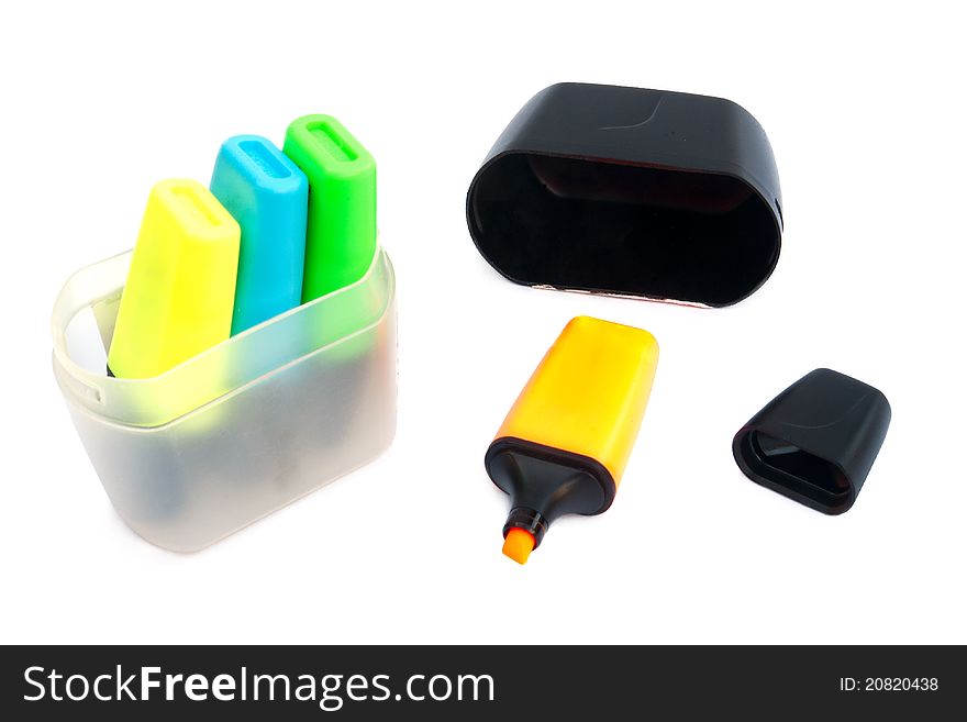 Colored markers isolated on a white background