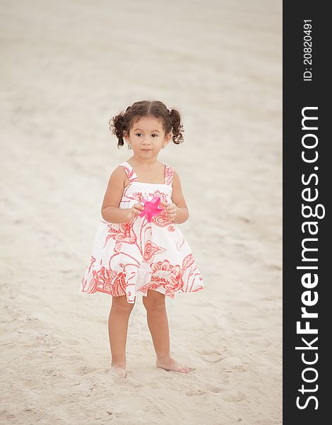 Toddler On The Beach
