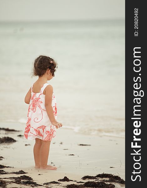 Image of a girl toddler on the beach