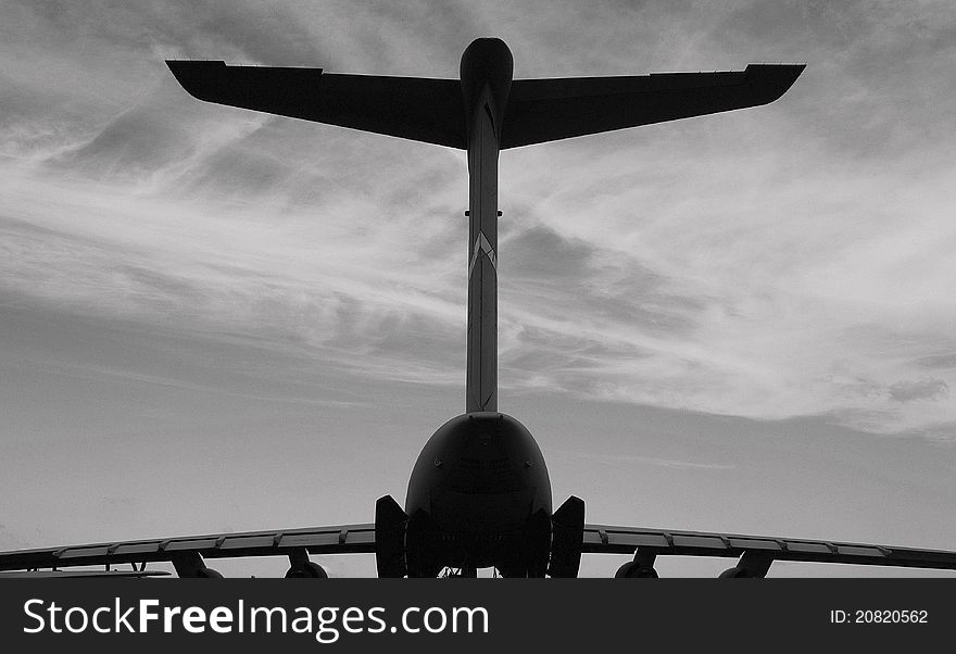 Silhouette of a heavy military transport aircraft the U.S. Air Force. Silhouette of a heavy military transport aircraft the U.S. Air Force