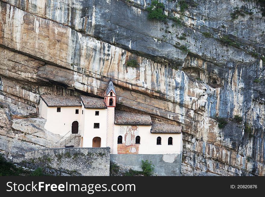 San Colombano hermitage in the North of Italy, Trentino A.A. region. Itâ€™s built over a overhanging rock of 120 meters. IX century