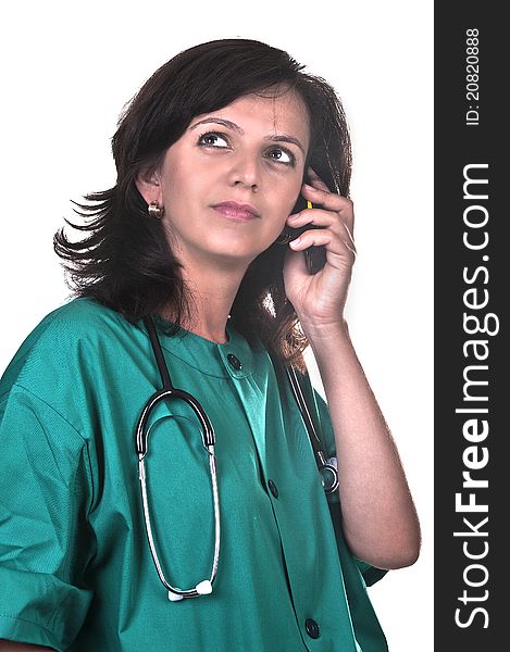 Female doctor talking on the phone on white background