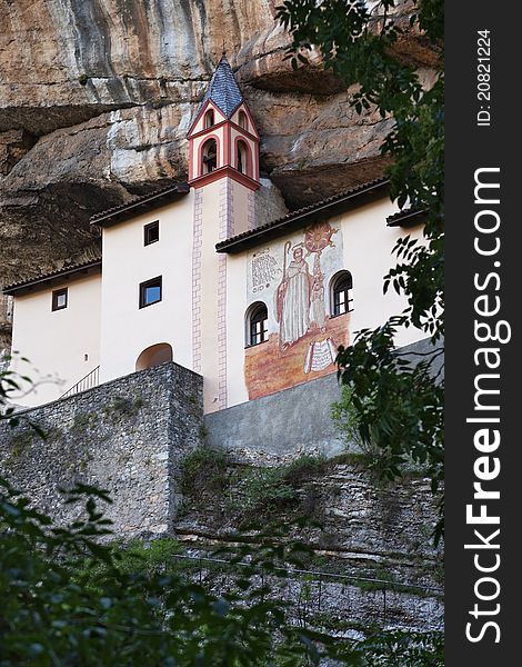 San Colombano hermitage in the North of Italy, Trentino A.A. region. Itâ€™s built over a overhanging rock of 120 meters. IX century