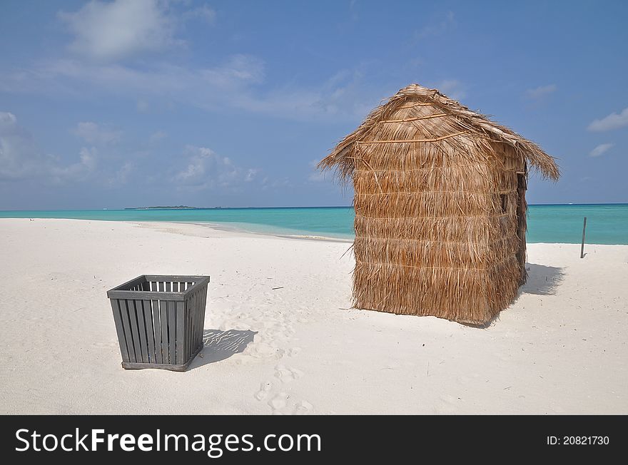Grass hut on a tropical island in the indian ocean. Grass hut on a tropical island in the indian ocean