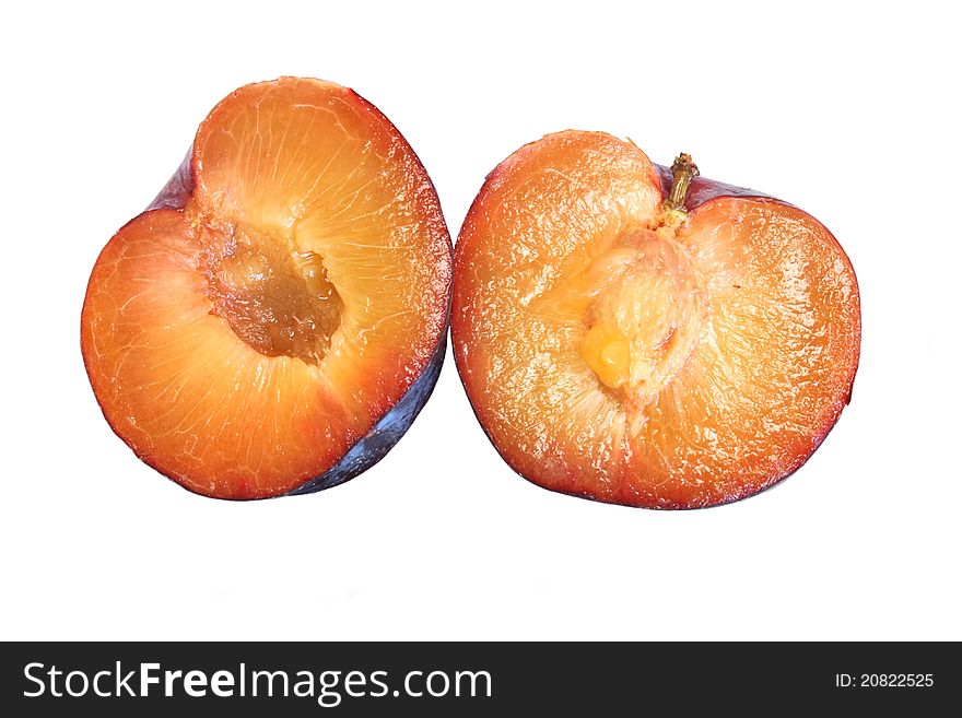 Ripe plums isolated over white background