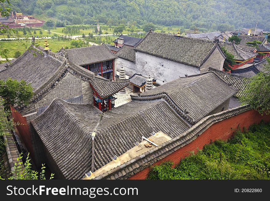 An aerial view over chinese tiles roofs in an ancient chinese village of mount wutai in shanxi province.