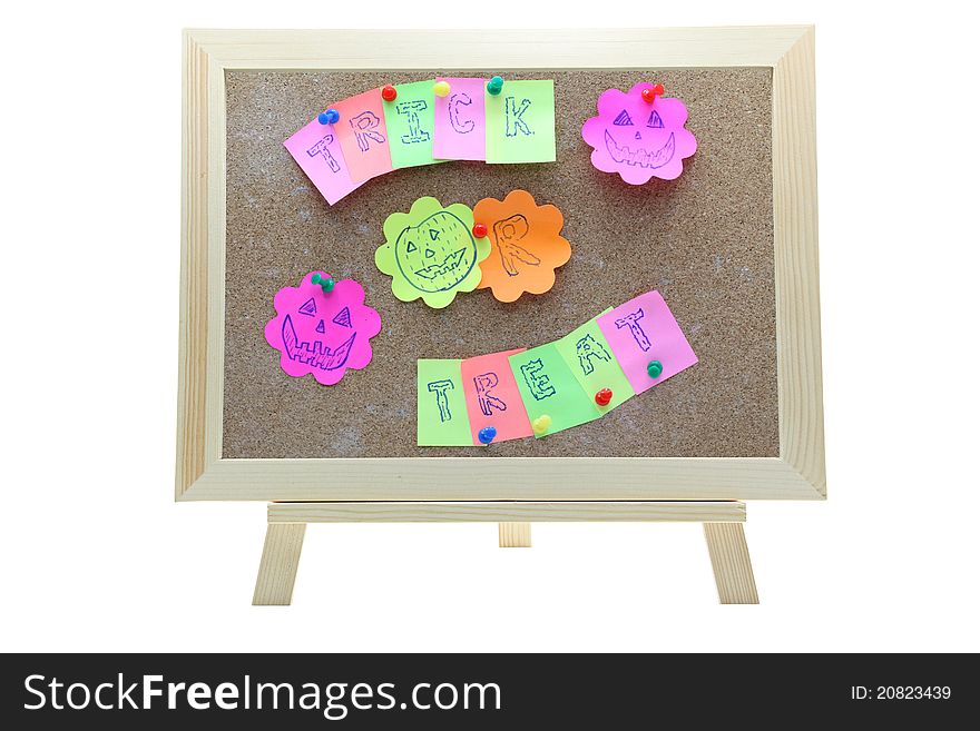 Trick ot treat made from paper memo stock craft attach on corkboard. Trick ot treat made from paper memo stock craft attach on corkboard