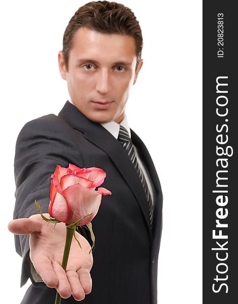 Young businessman hold rose