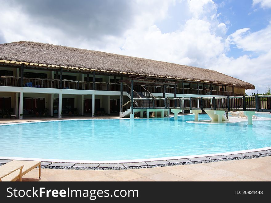 A relaxing luxury resort swimming pool. A relaxing luxury resort swimming pool