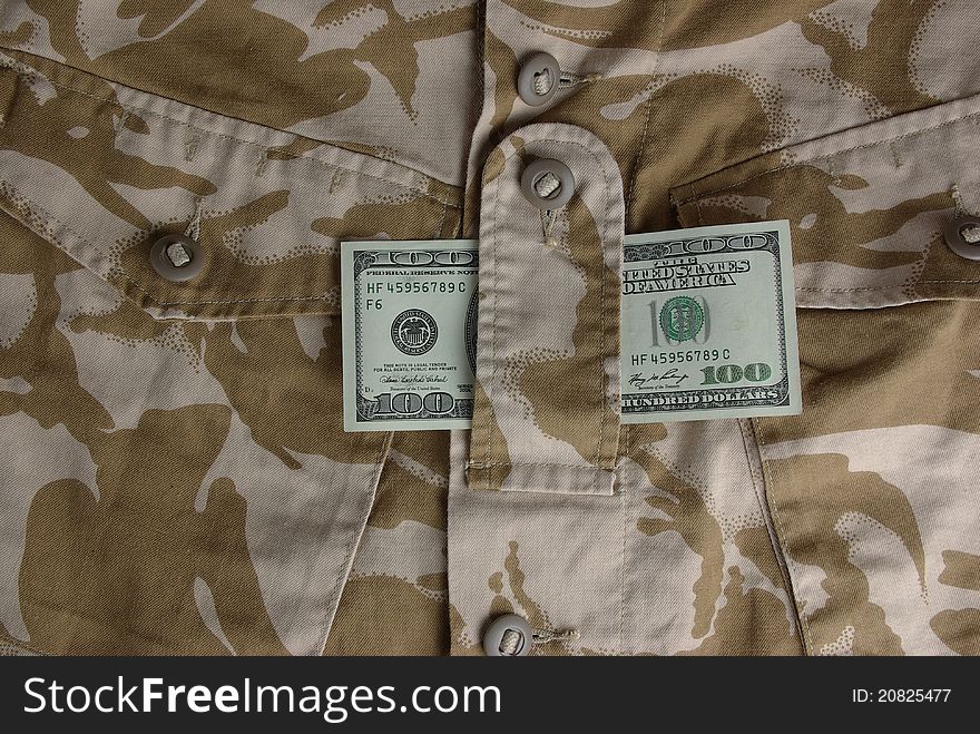 Combat uniform with a dollar banknote. Combat uniform with a dollar banknote