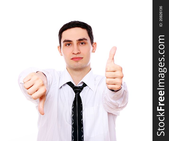 Businessman holding one thumb up and another down isolated over white