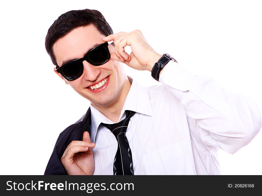 Young and attractive businessman in sunglasses isolated on white. Young and attractive businessman in sunglasses isolated on white