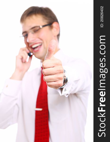 Businessman shows OK sign while calling by phone