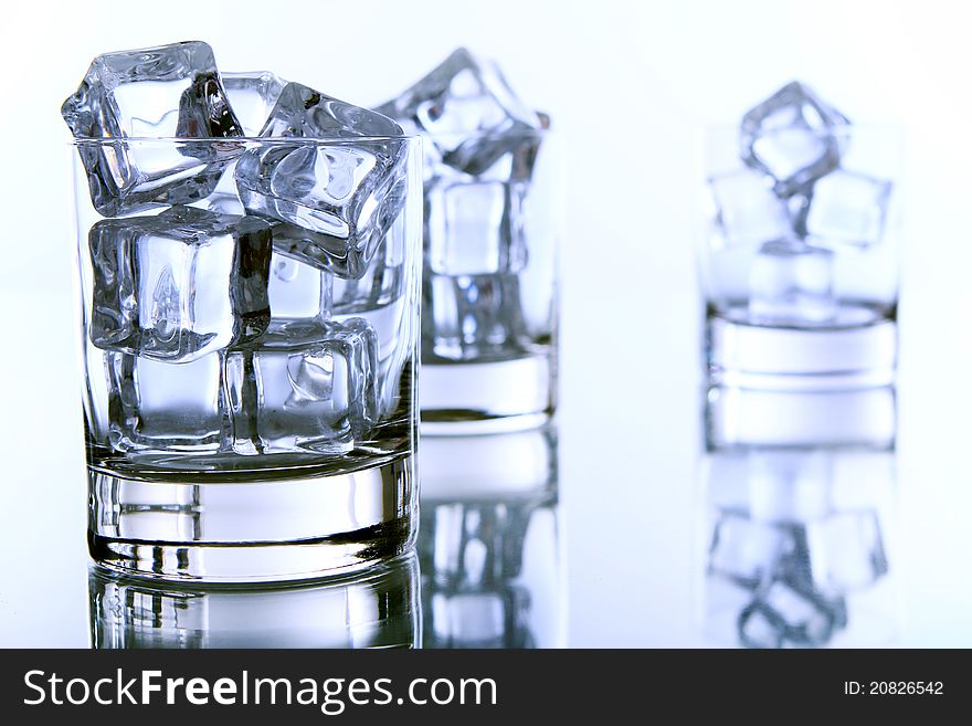 Glass filled with ice cubes