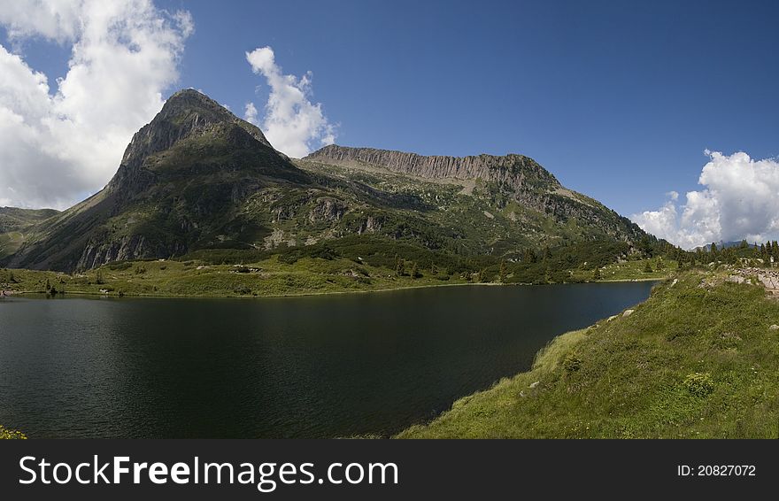 A big panorama of the Colbricon Lake, Dolomites, Italy. A big panorama of the Colbricon Lake, Dolomites, Italy