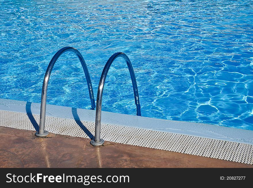 Swimming pool with the ladder