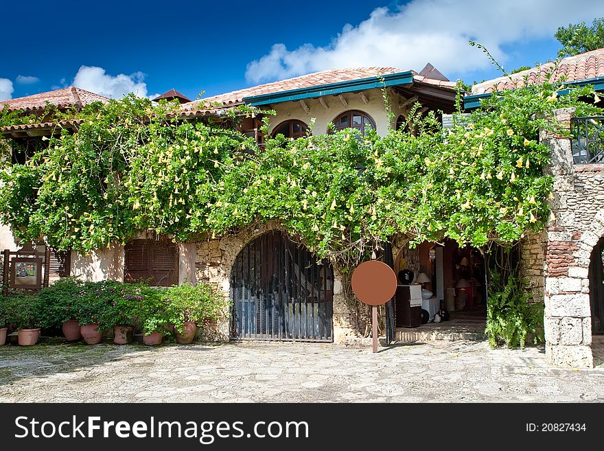 Old style Dominican eating house with green trees