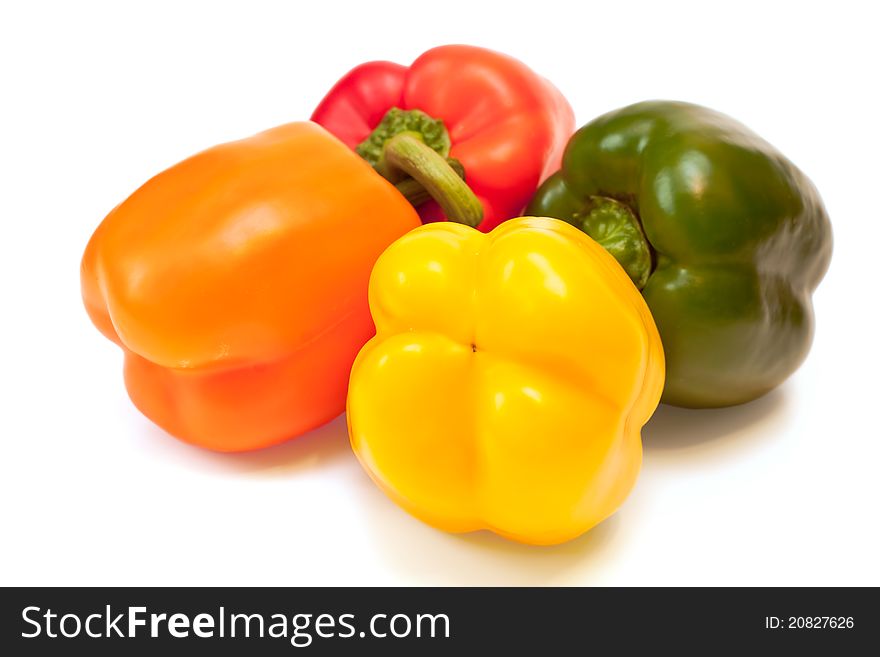 Sweet pepper with a shadow on a white background