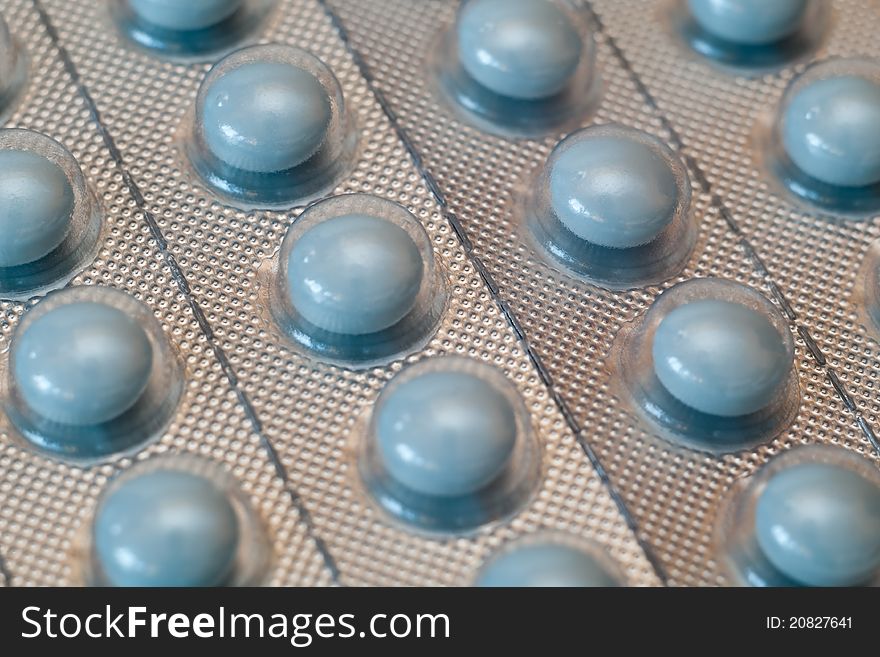 Plate of tablets in a blue environment. Plate of tablets in a blue environment