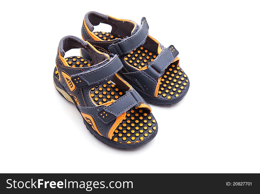 A pair of child's shoes on white background with good clipping path