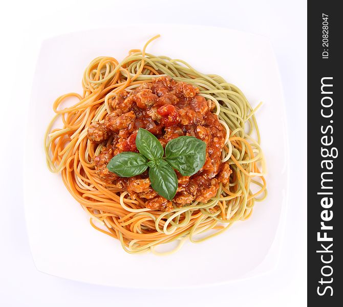 Colorful Spaghetti bolognese on a plate