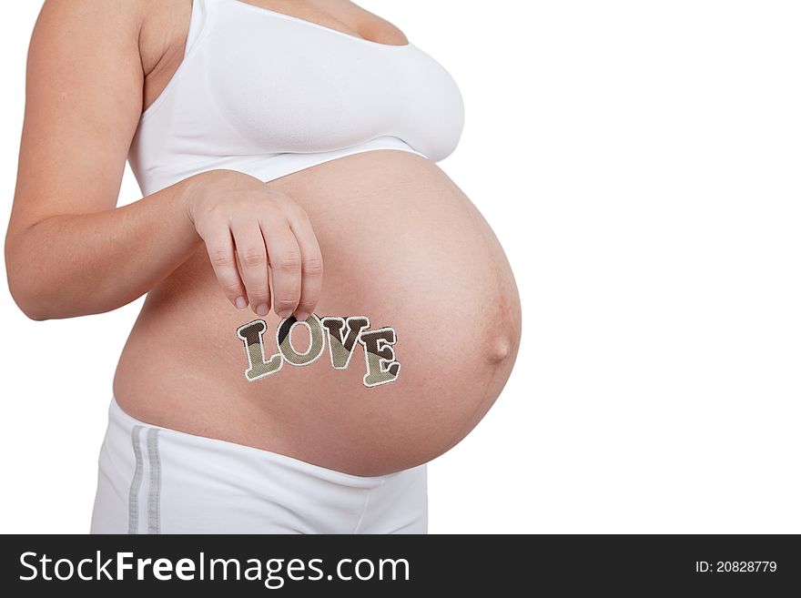 Pregnant woman hold word love on in hands on white background. Pregnant woman hold word love on in hands on white background