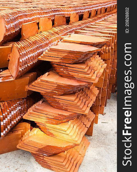 Stack of ceramic roof tiles for make Thai Church