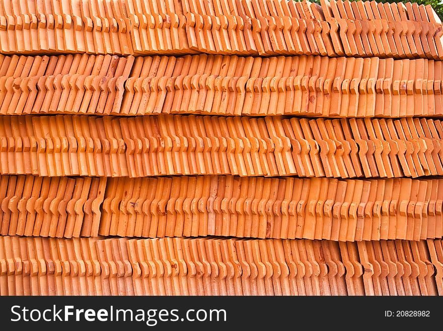 Stack of ceramic roof tiles for make Thai Church