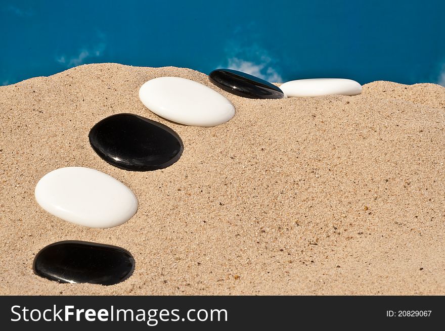 Ying and yang pathway on a beach. Ying and yang pathway on a beach