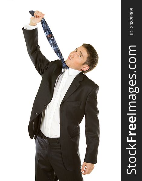 Business Frustration - Mature man pulling necktie to choke himself on white background