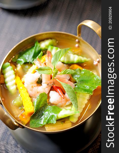 A bowl of seafood curry in thai style