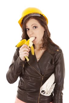 Construction Woman Eat Banana Stock Photography