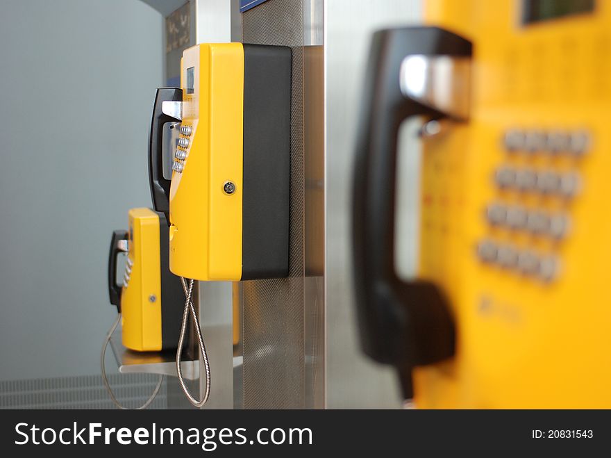 Yellow public telephone