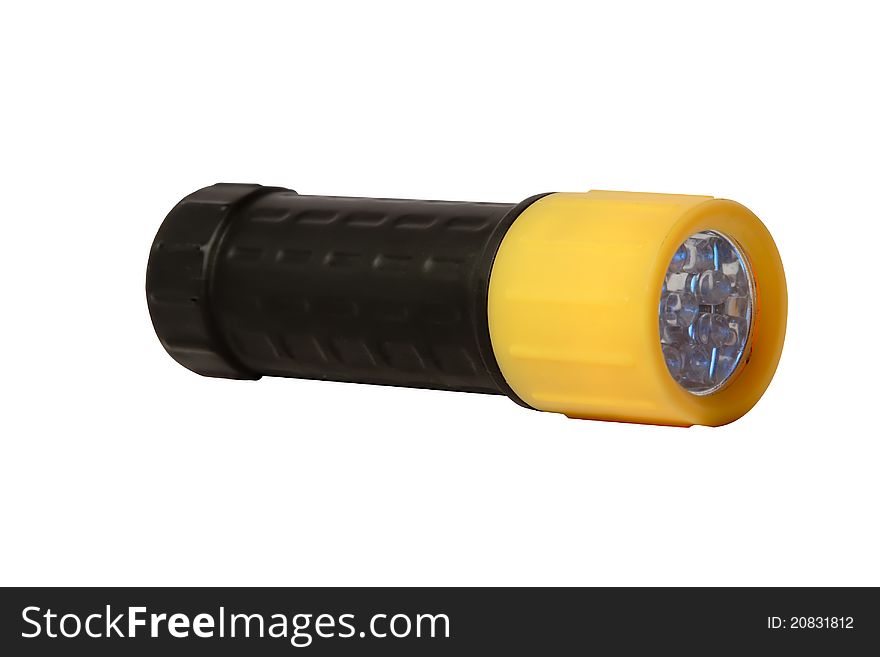 Flashlight laying on white background