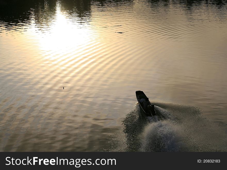 Riding Boat With Wave And Light Reflection