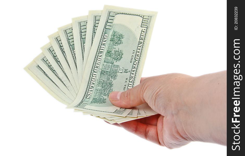 Hand holding hundred dollar notes