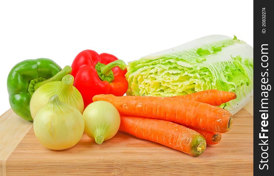 Raw fresh vegetables. Close up on white background