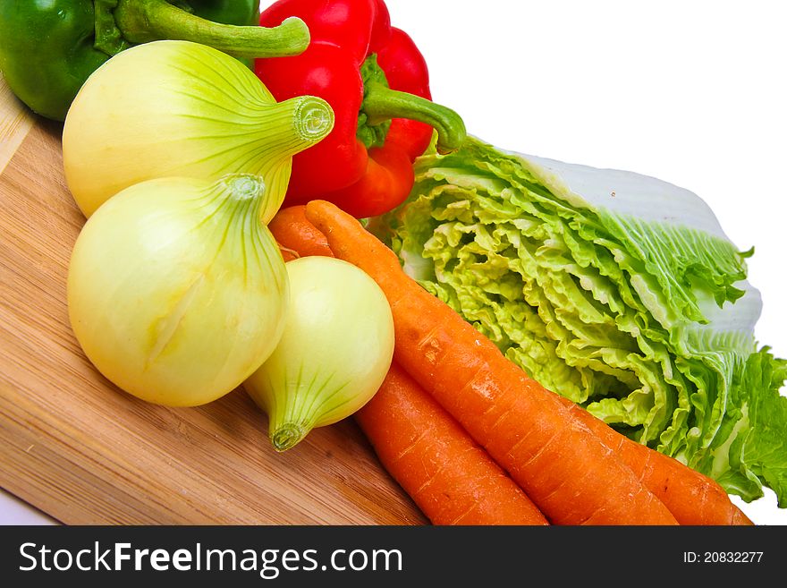 Raw fresh vegetables. Close up on white background