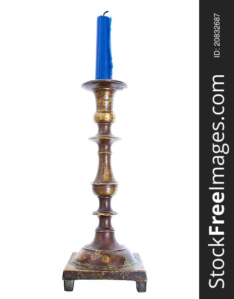 Restored vintage candlestick with candle