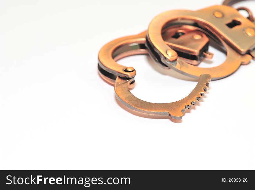 A pair of handcuffs uncuffed