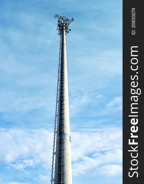 Transmitter with blue sky and clouds