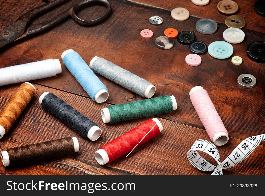 Vintage set of threads, scissors and buttons