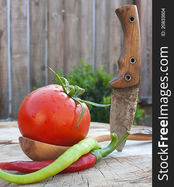 Fresh vegetables and hand made knife an wooden spoon. Fresh vegetables and hand made knife an wooden spoon