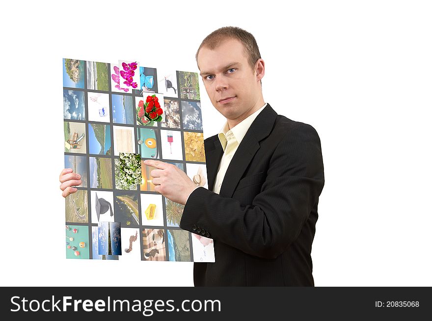 Young man in suit holding multimedia tablet, and choosing options, on white background. Young man in suit holding multimedia tablet, and choosing options, on white background