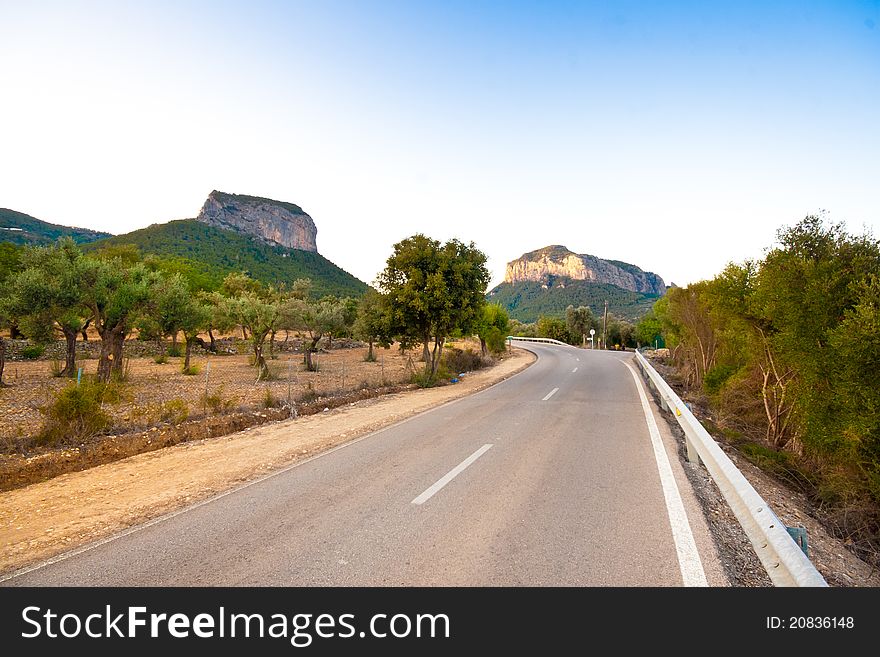 Sweeping road under the mountains. Sweeping road under the mountains