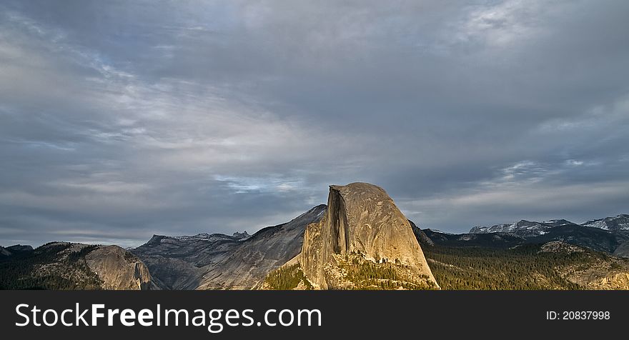 Sun setting on half dome,yosemite.