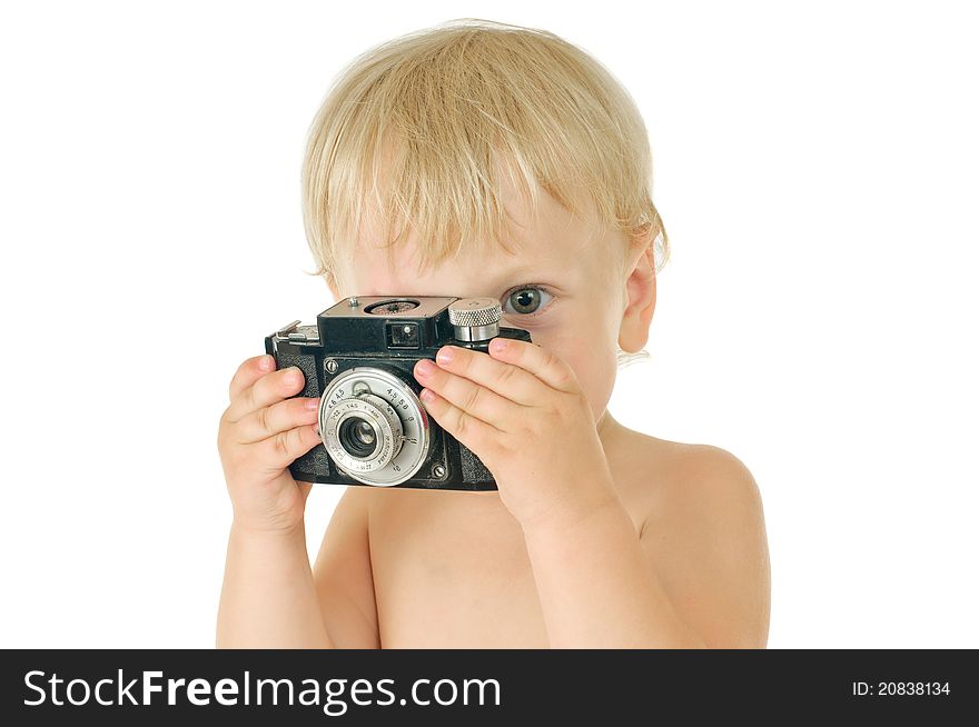 Little boy with old photographic camera on white background. Little boy with old photographic camera on white background