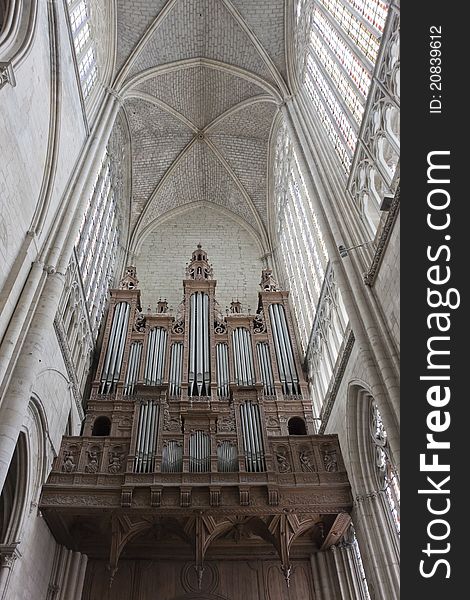 Old wooden organ in a french gothic cathedral.