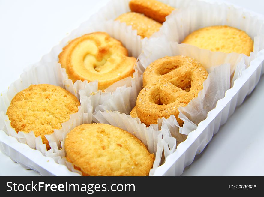 Variety of assorted tea time biscuits isolated on a white background