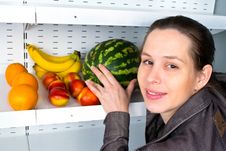 Image Of A Woman Buying Fruits In Market. Stock Photo